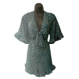 Floral jumpsuit/romper with front tie. Size large. Never worn.